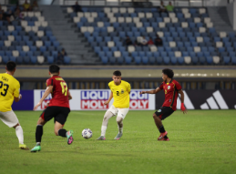 Players competing for possession during a match